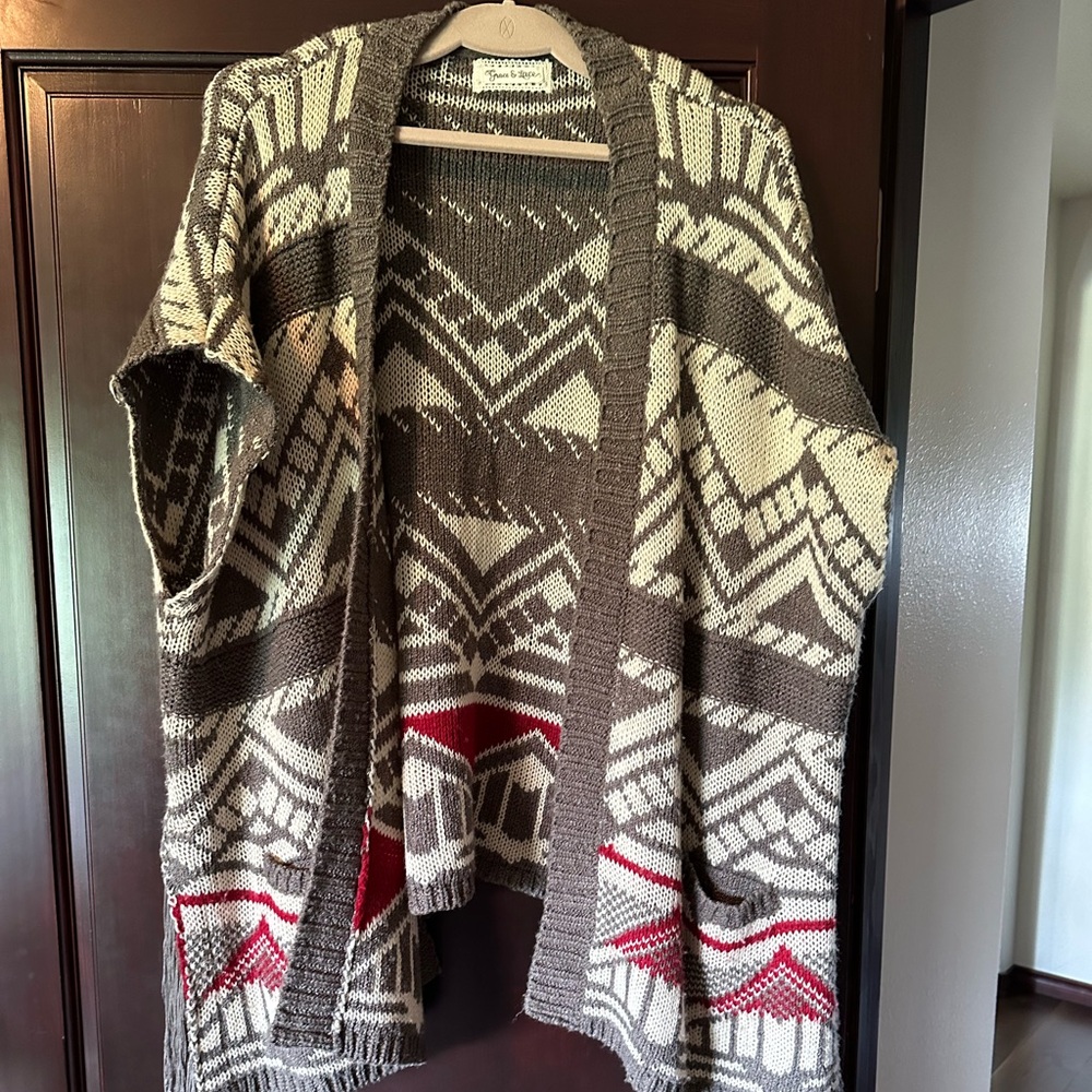 Western style long sweater vest!